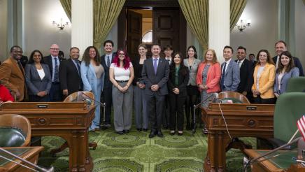 Asm. Ward and other members pose with the fellows